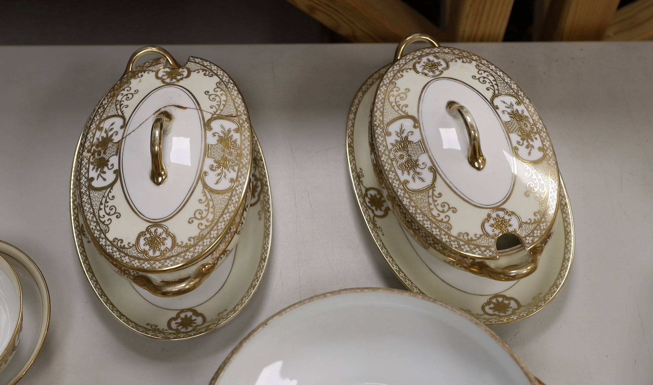 A Noritake gilt bordered dinner service